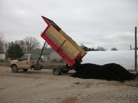 Ski Landscape Truck dumping 12 cubic yards of Mulch