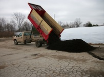 8 cubic yards dumped out of Ski Landscape truck 